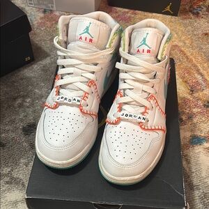 Air Jordan White Sneakers with Orange and Green Accents